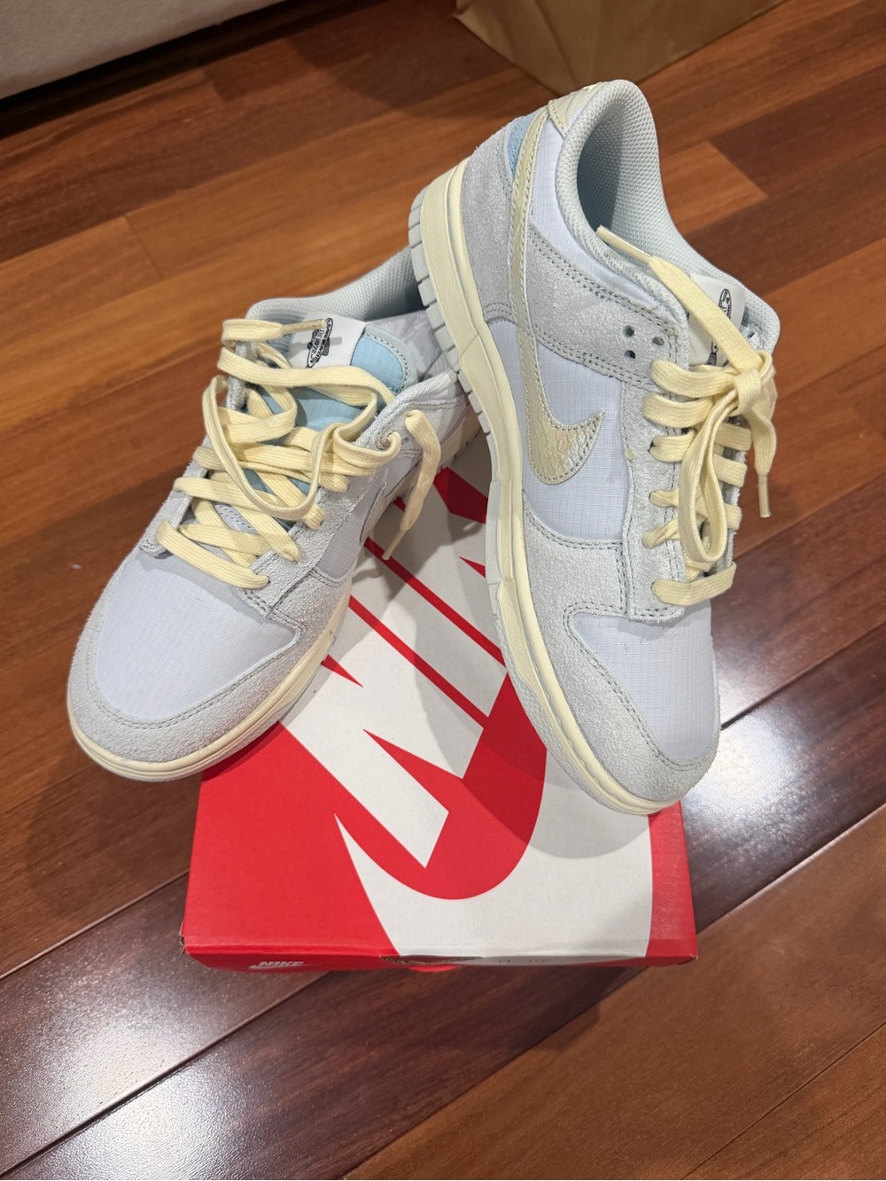 Nike Low-Top Sneakers in Light Blue & Cream